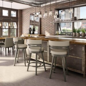a brick wall kitchen with bar stools and an island