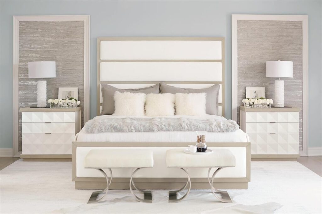 Thumbnail of http://a%20bedroom%20with%20a%20large%20bed%20and%20white%20furniture