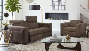 a living room filled with furniture and a fire place