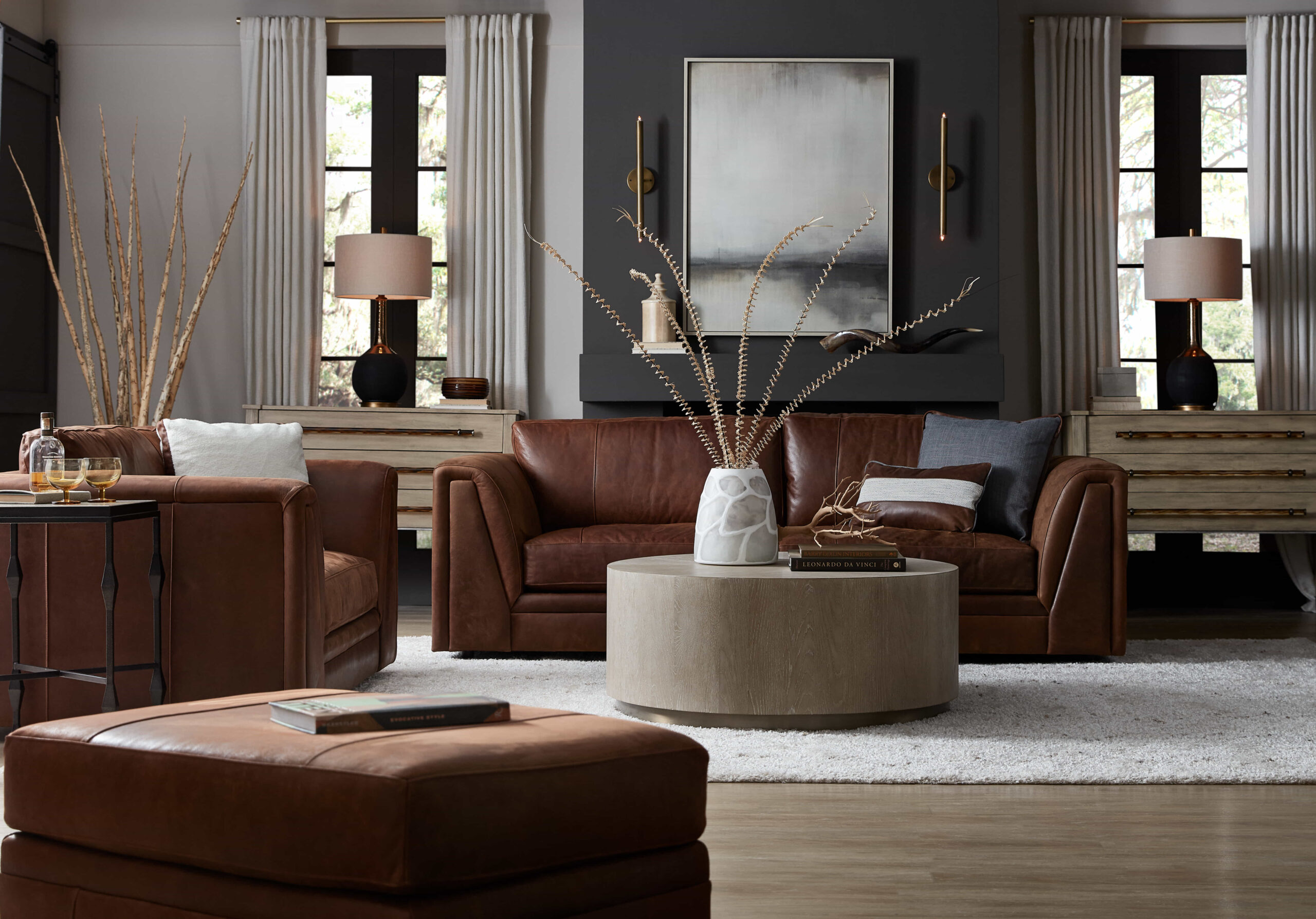 a living room filled with furniture and a large window