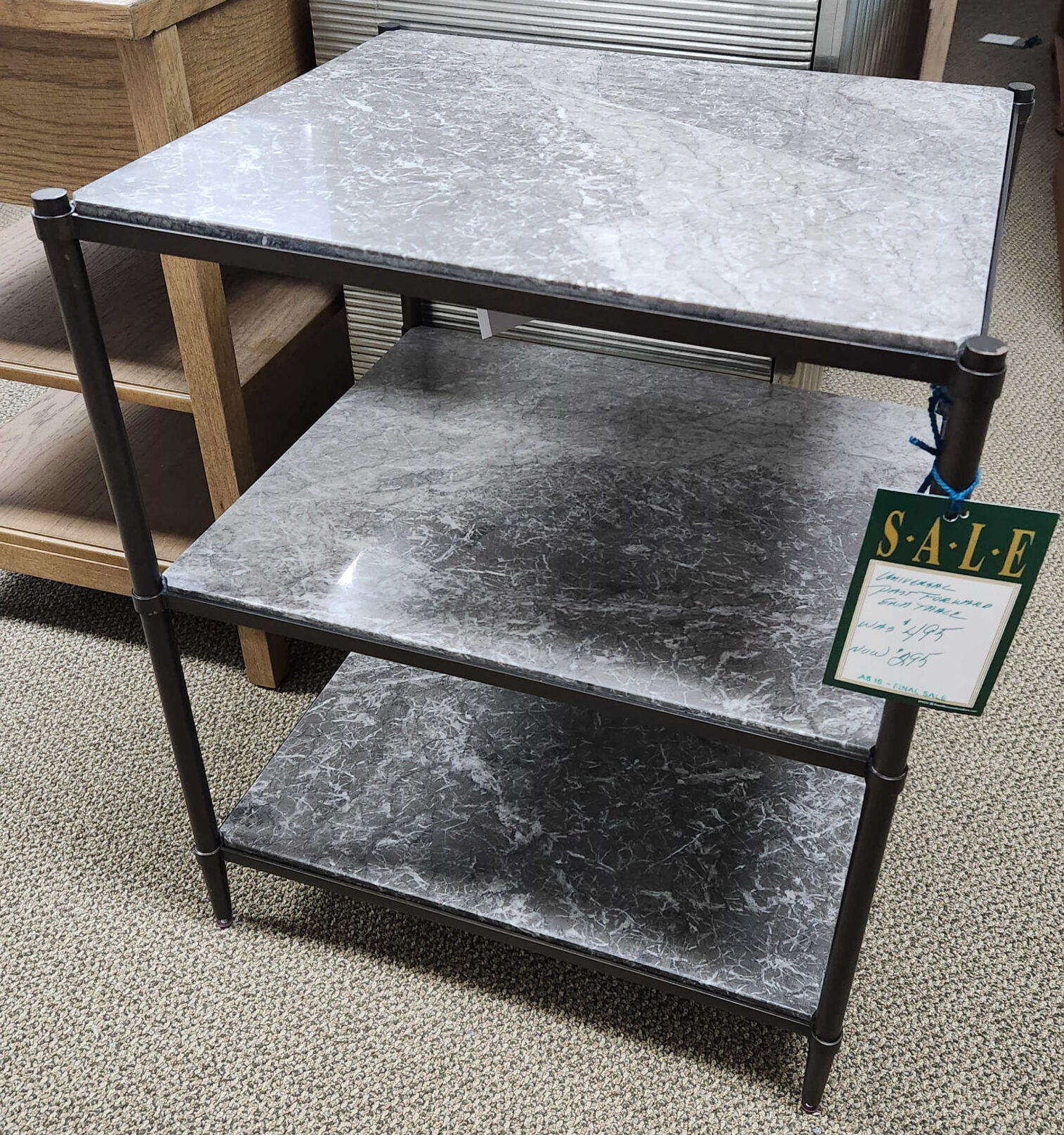 a couple of mirrors sitting on top of a wooden shelf