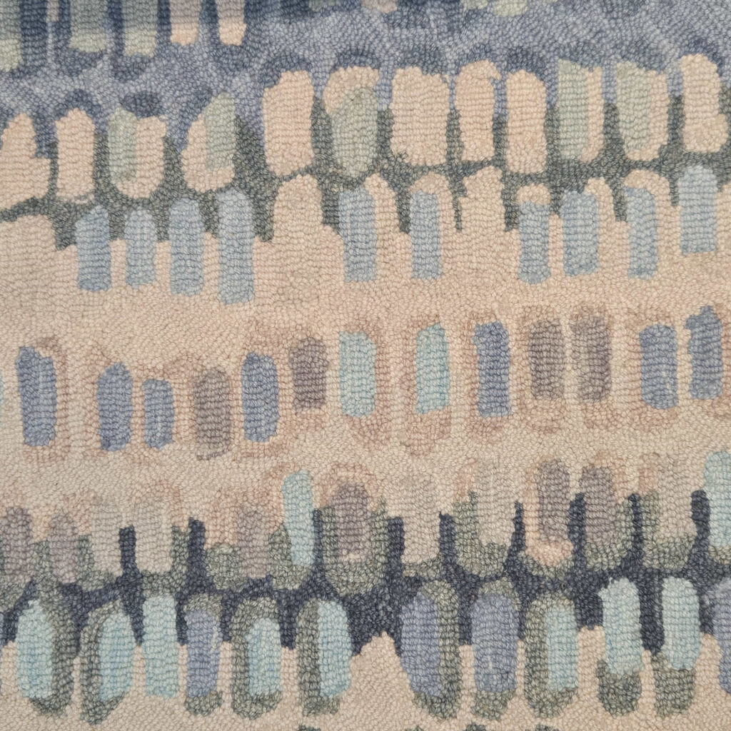 Thumbnail of http://a%20close%20up%20of%20a%20rug%20with%20a%20pattern%20on%20it