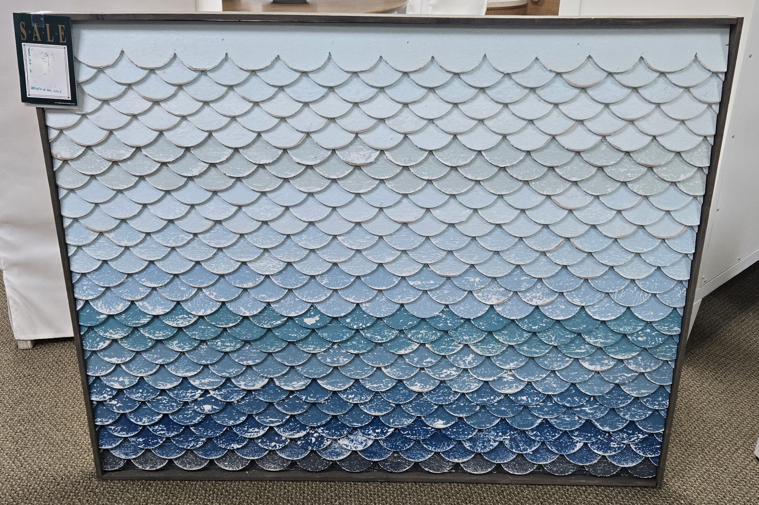 a picture of a blue and white fish scale