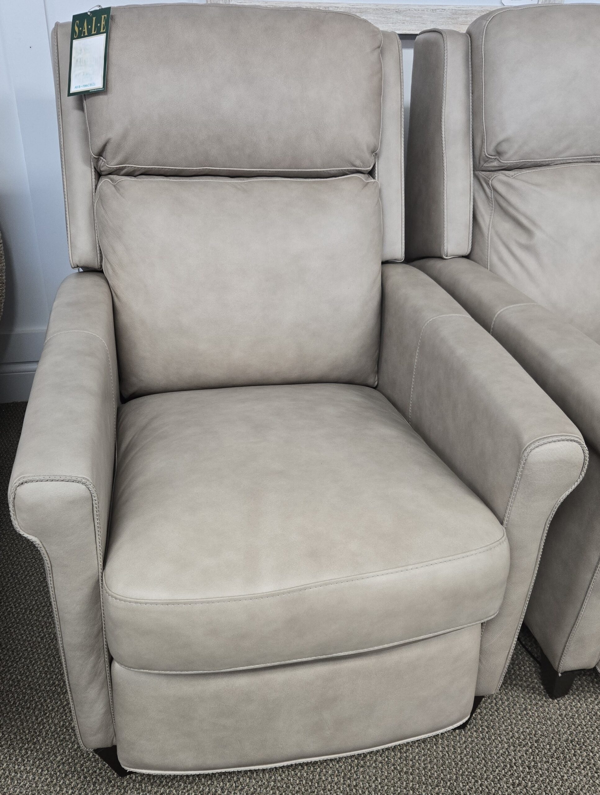 a pair of reclining chairs in a room
