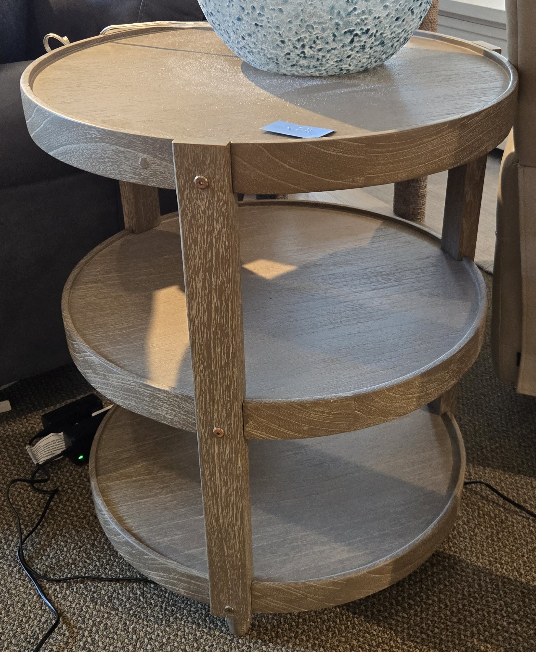 a table with a vase on top of it