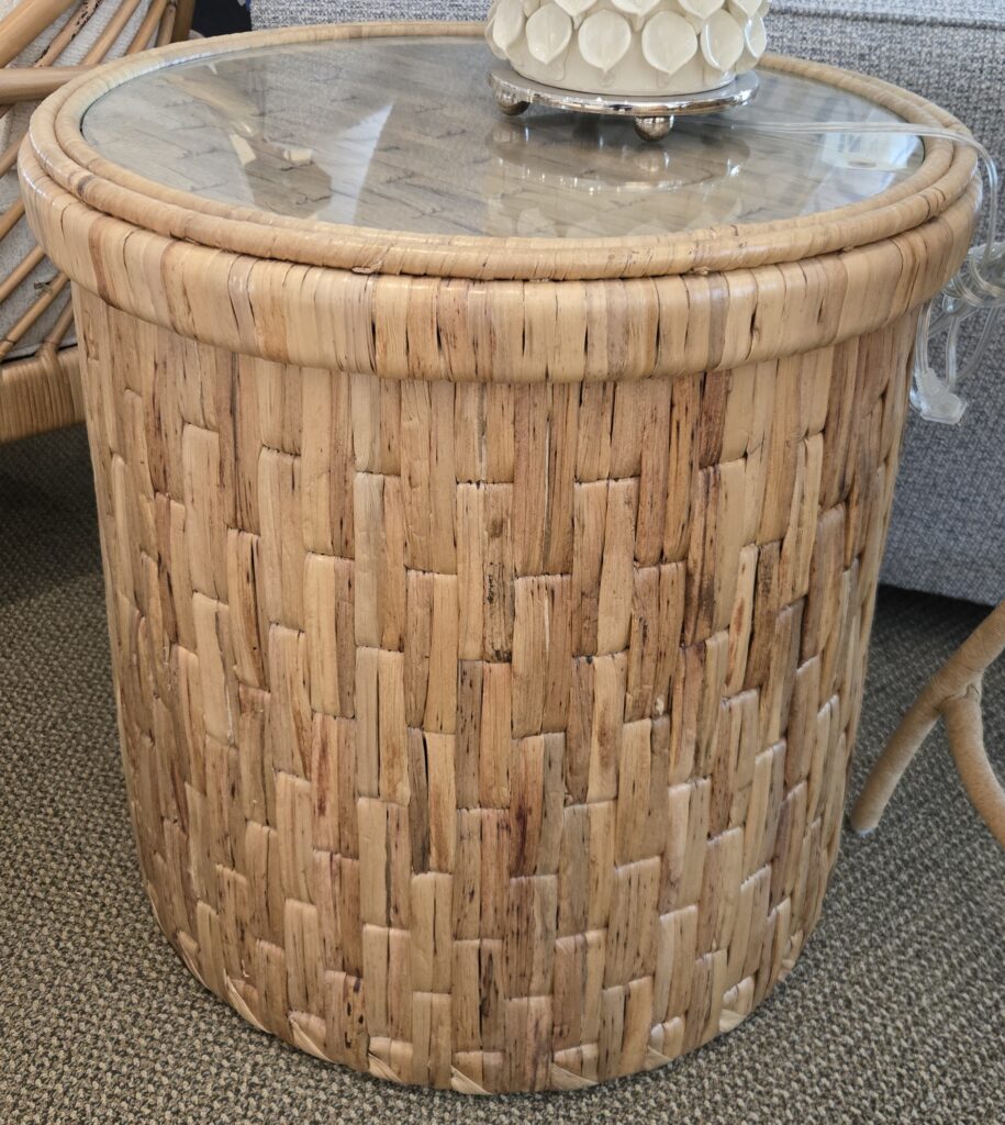 Thumbnail of http://a%20wicker%20table%20with%20a%20glass%20top