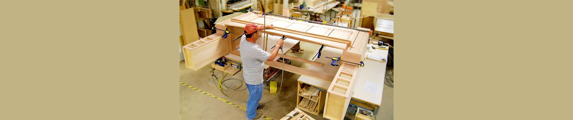a man working on a shelf in a store