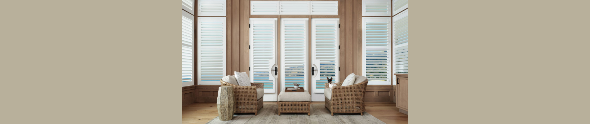 a room with a large window with shutters