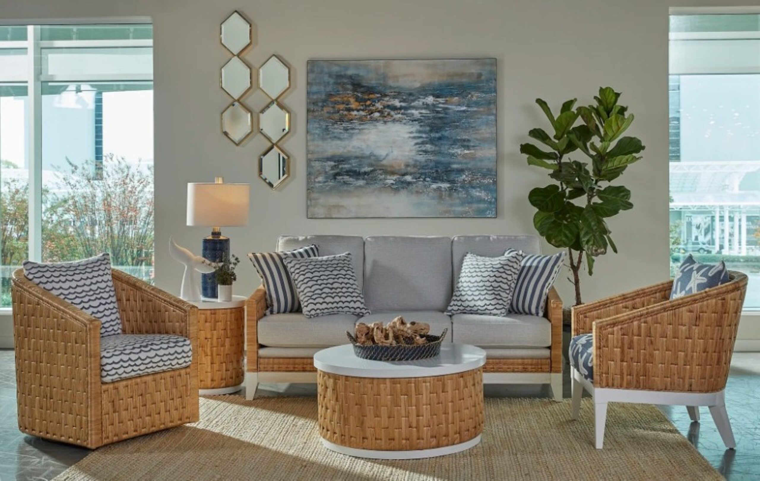 a living room filled with furniture and a painting on the wall