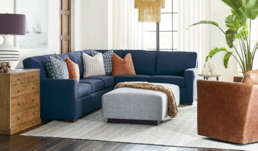 Thumbnail of http://a%20living%20room%20filled%20with%20furniture%20and%20a%20large%20plant