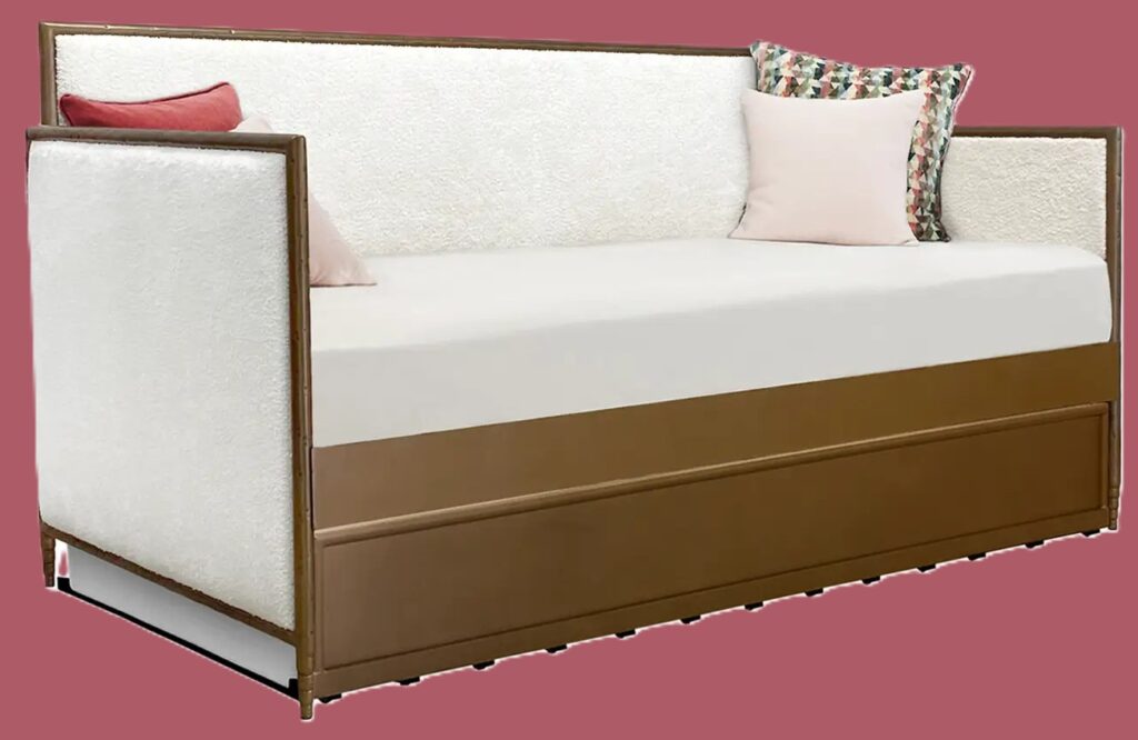 Thumbnail of http://a%20white%20and%20brown%20daybed%20against%20a%20pink%20background