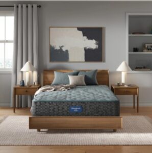 a bedroom with a bed, nightstands and a painting on the wall