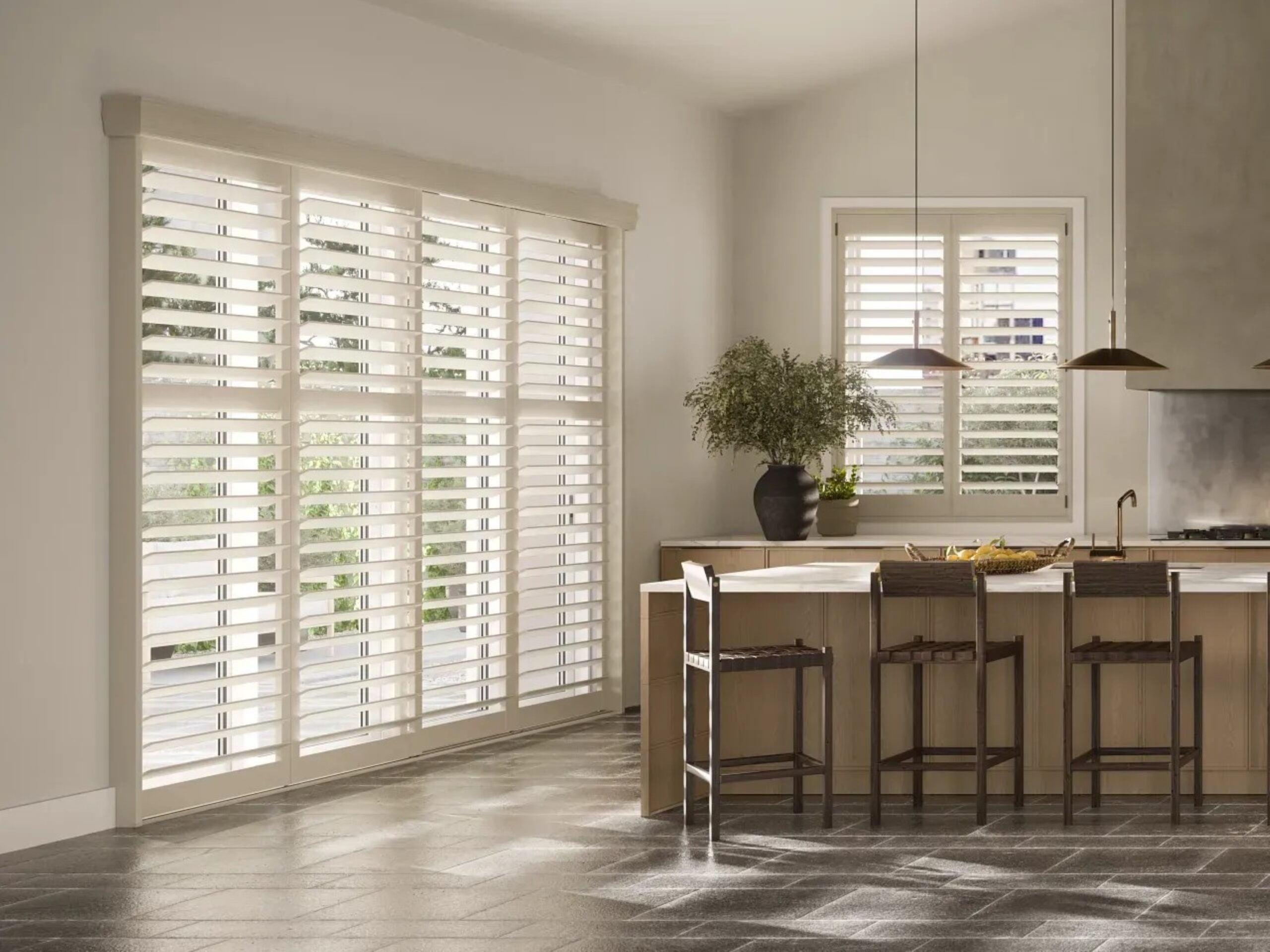 a kitchen with a center island and a stove top oven