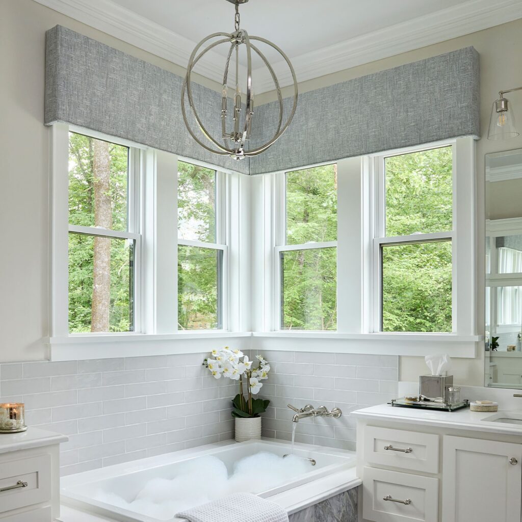 Thumbnail of http://a%20white%20bathroom%20with%20a%20tub%20and%20a%20chandelier