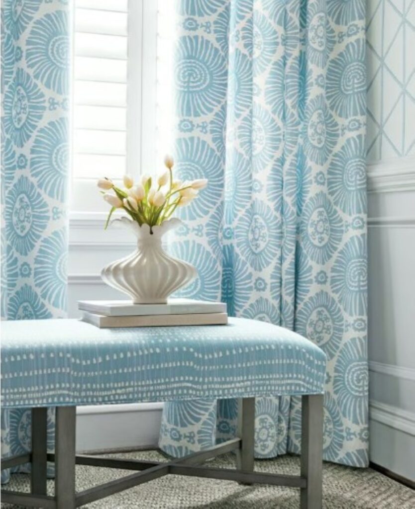 Thumbnail of http://a%20vase%20with%20flowers%20on%20a%20bench%20in%20front%20of%20a%20window