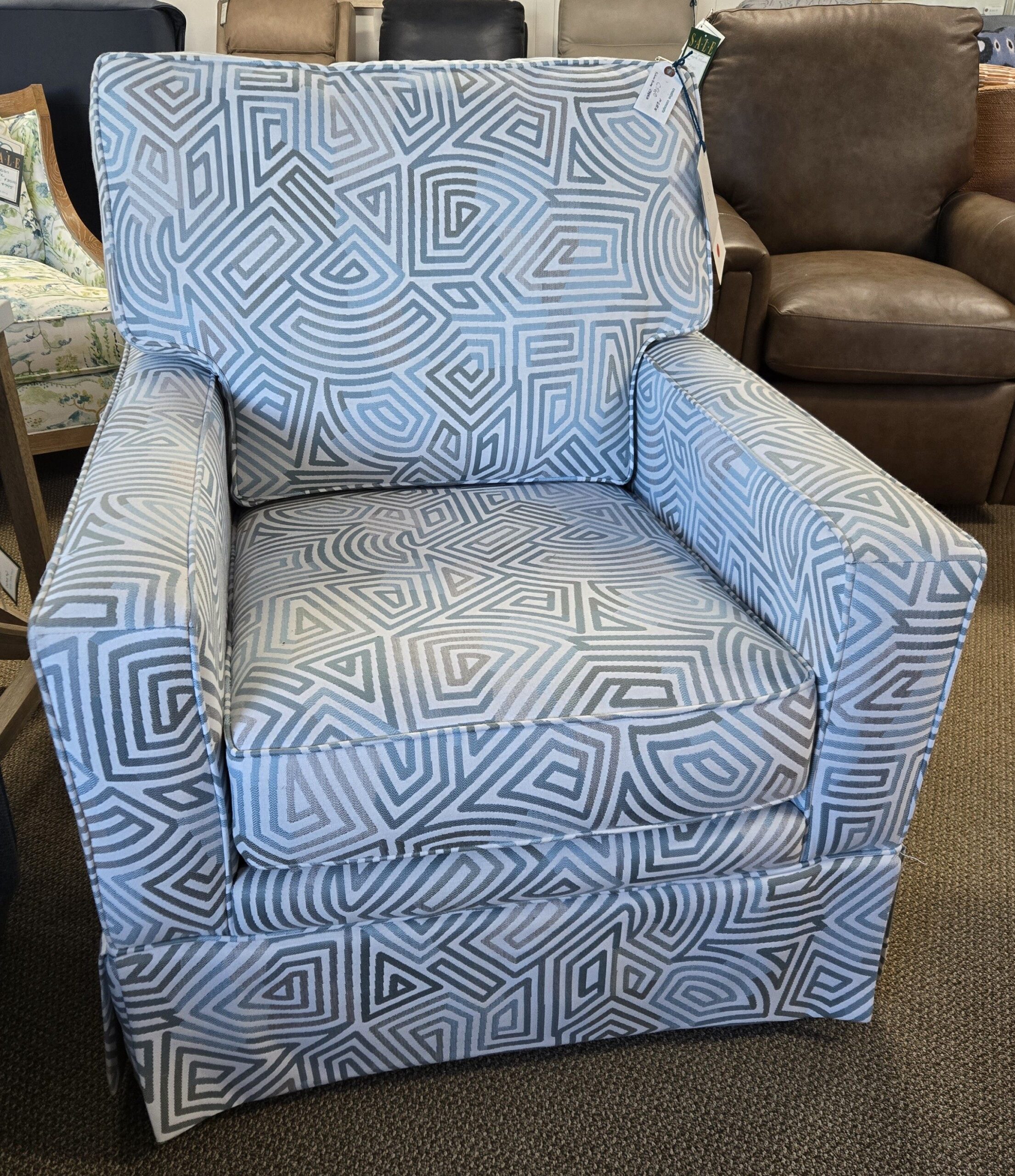 a blue and white chair in a store
