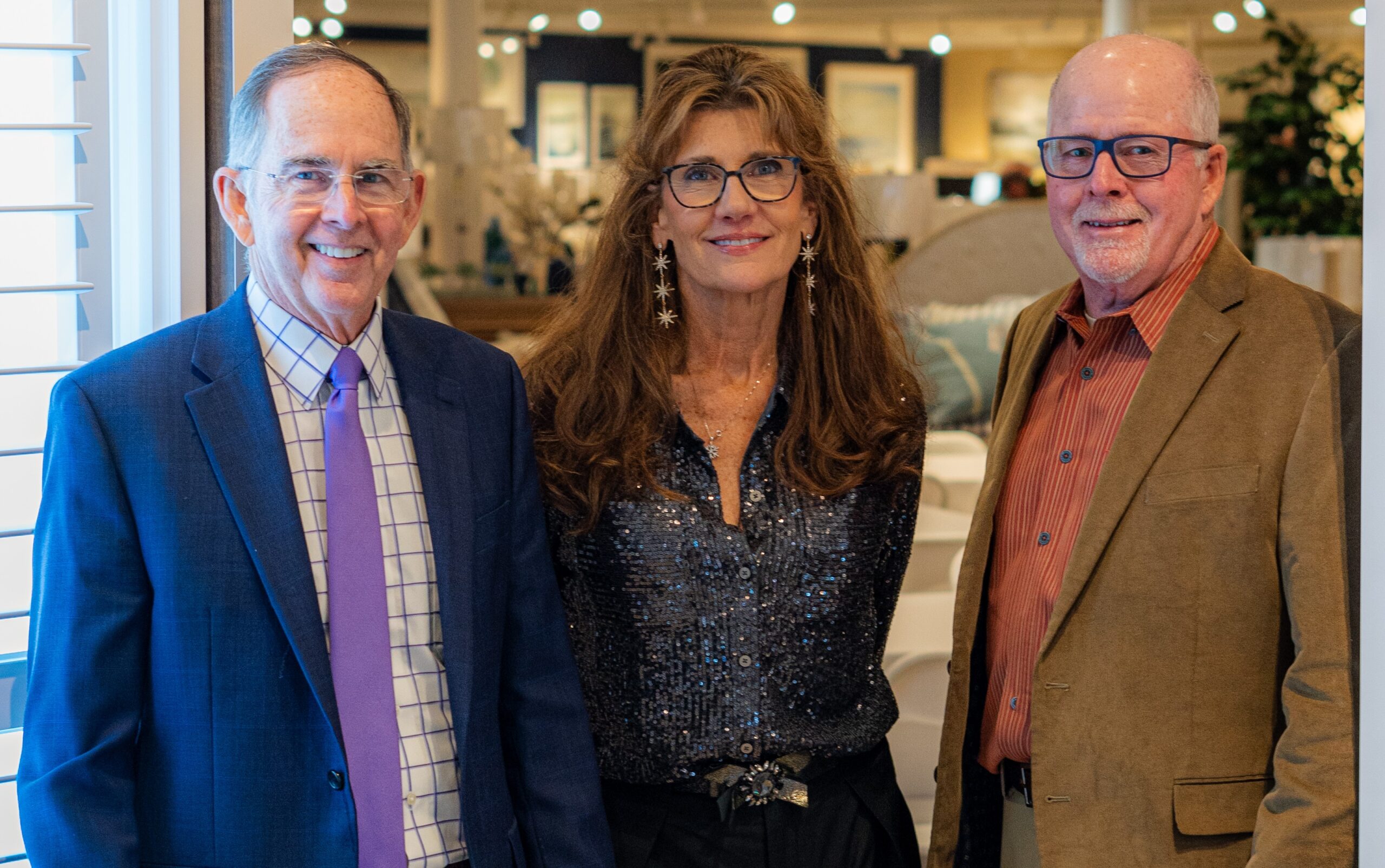 a group of people standing next to each other