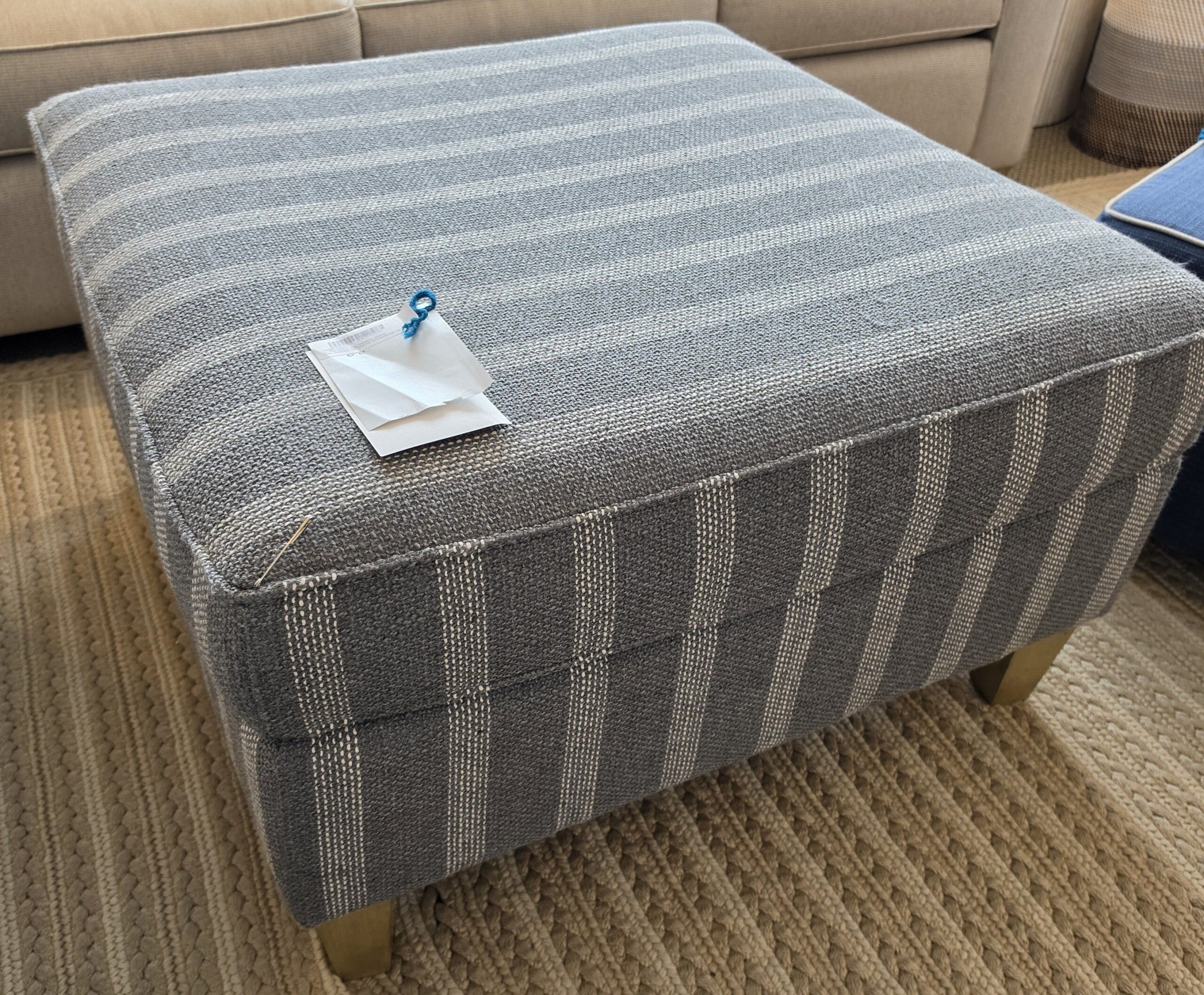 a couch and ottoman in a living room