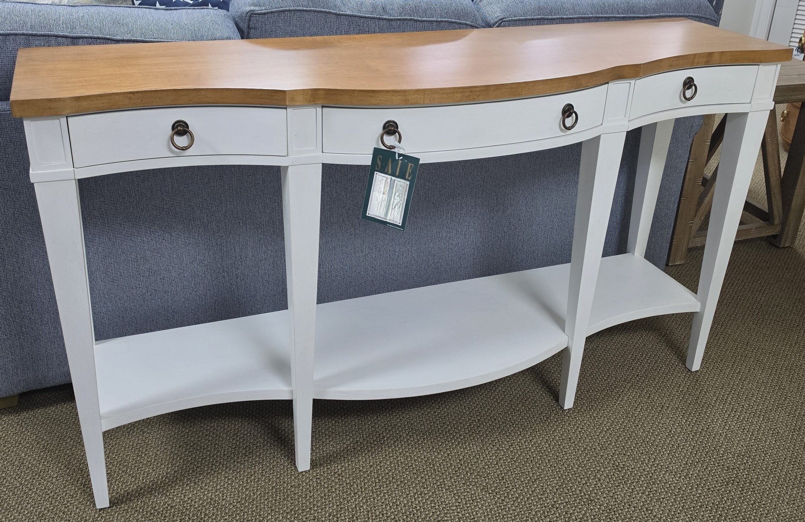a white table with a wooden top