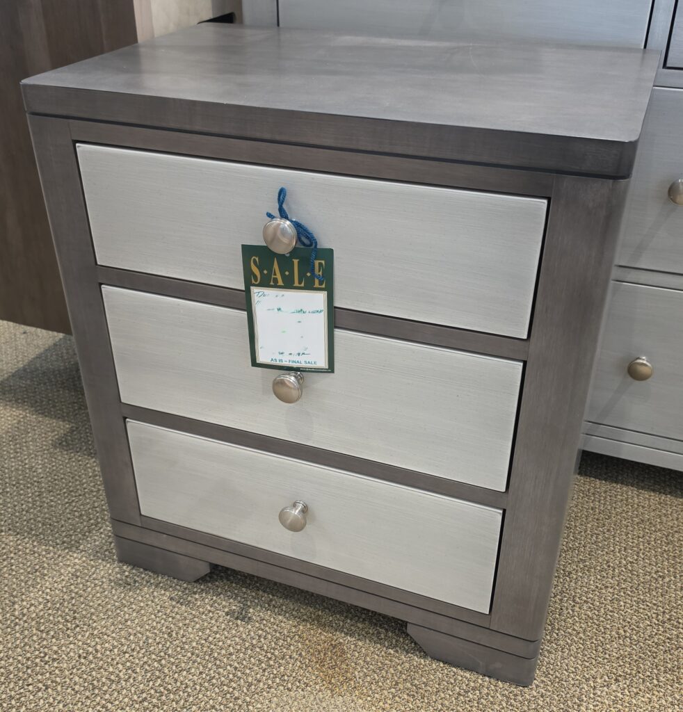 Thumbnail of http://a%20grey%20and%20white%20dresser%20with%20a%20tag%20on%20it
