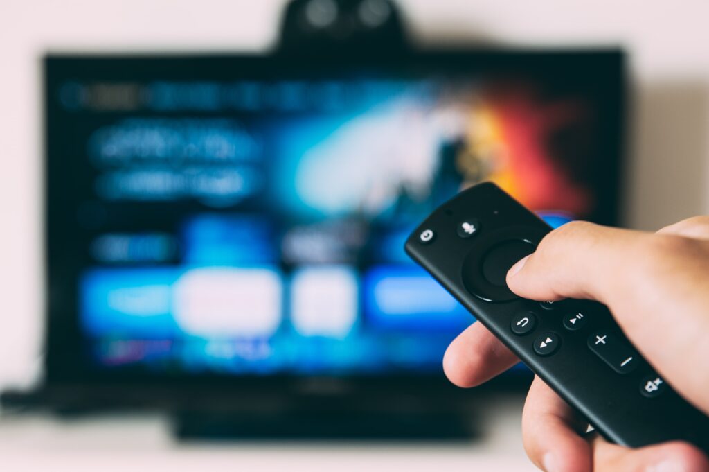 Firestick TV remote pointed at TV