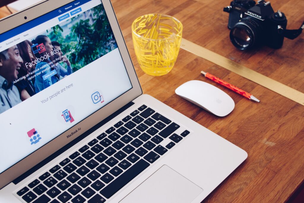 Macbook displaying a page titled "Facebook Ads"