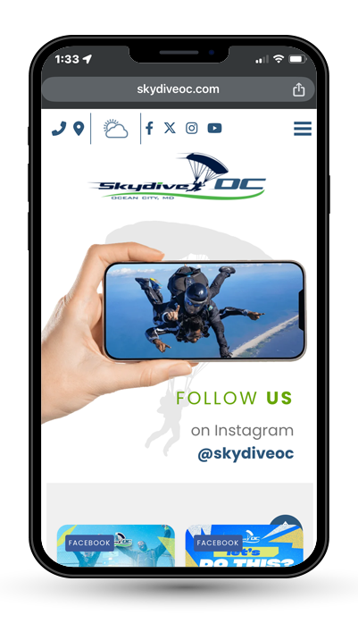 Cell phone displaying website for skydive OC