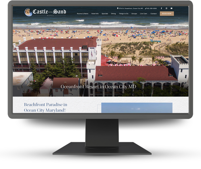 Monitor displaying home page of Castle in The Sand
