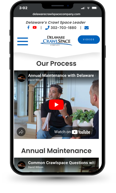 Cell phone displaying DE Crawlspace logo