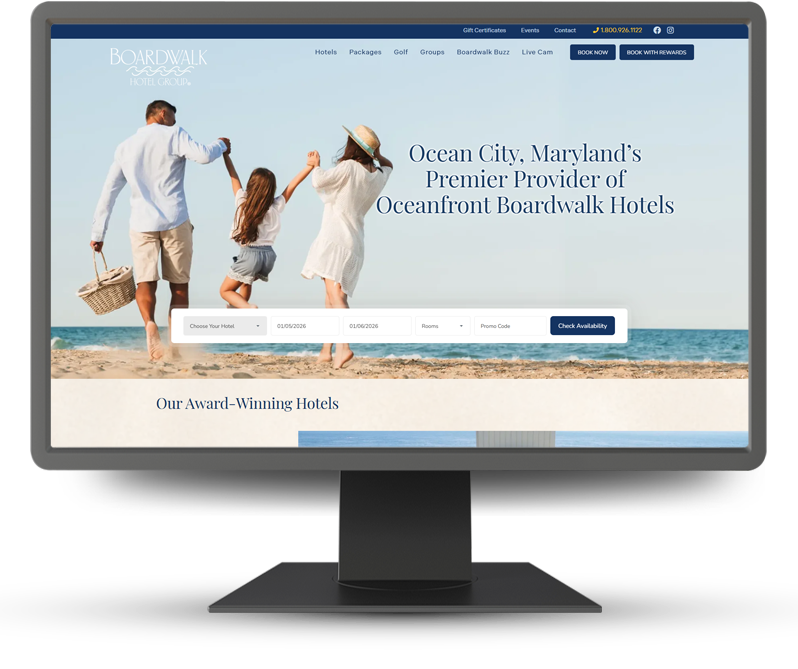 Monitor displaying home page of Boardwalk Hotel Group