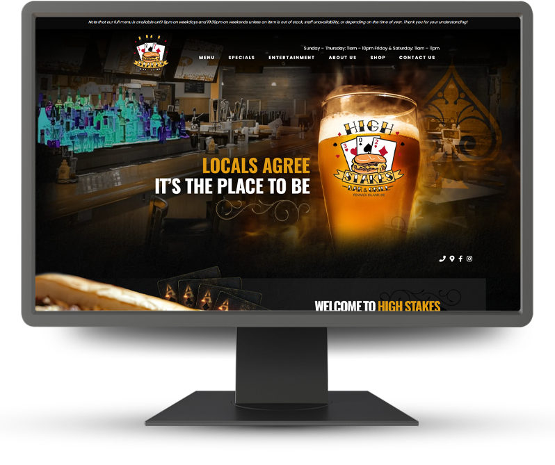 Monitor displaying home page of High Stakes Bar & Grill