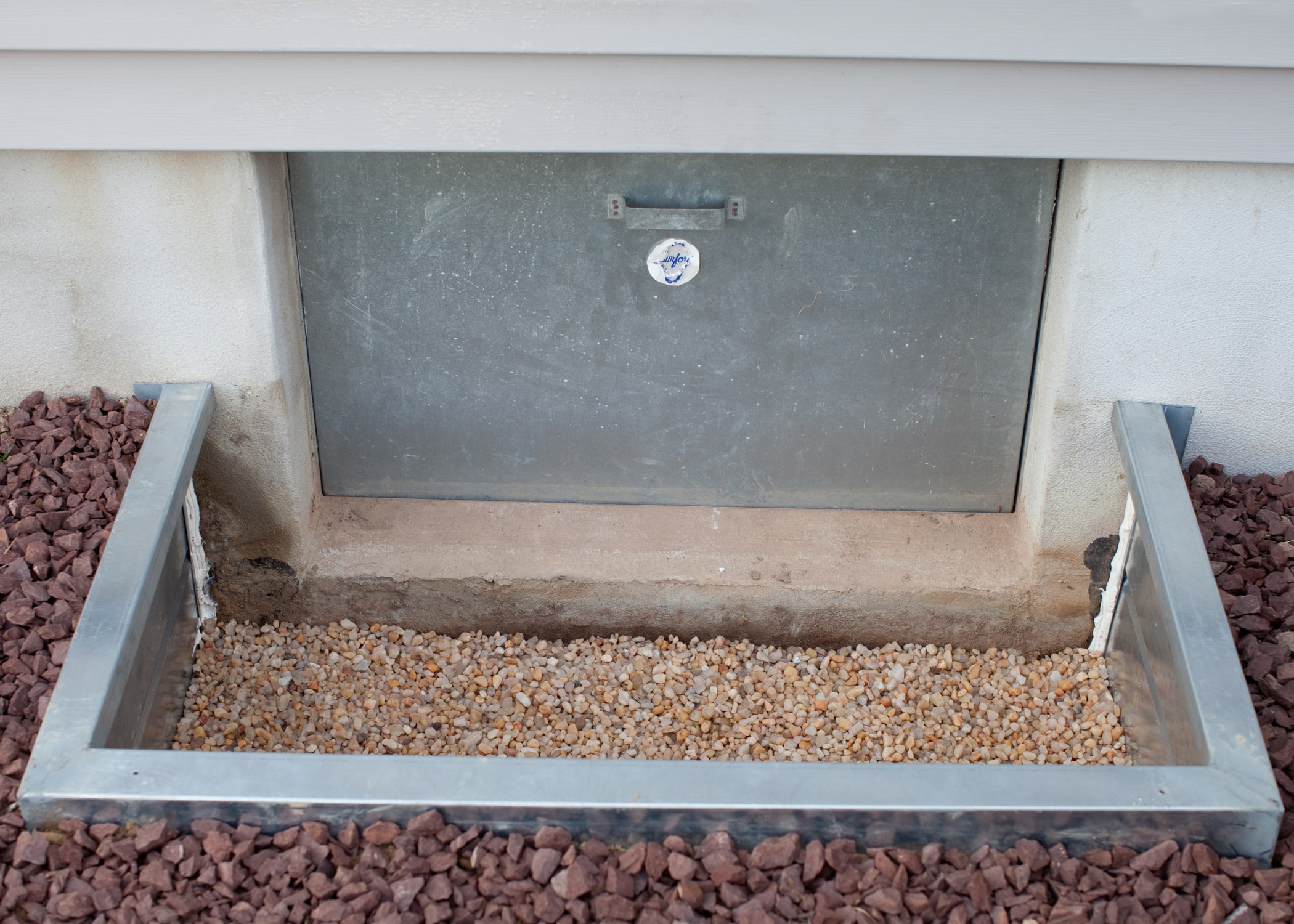 crawl space metal access well and door