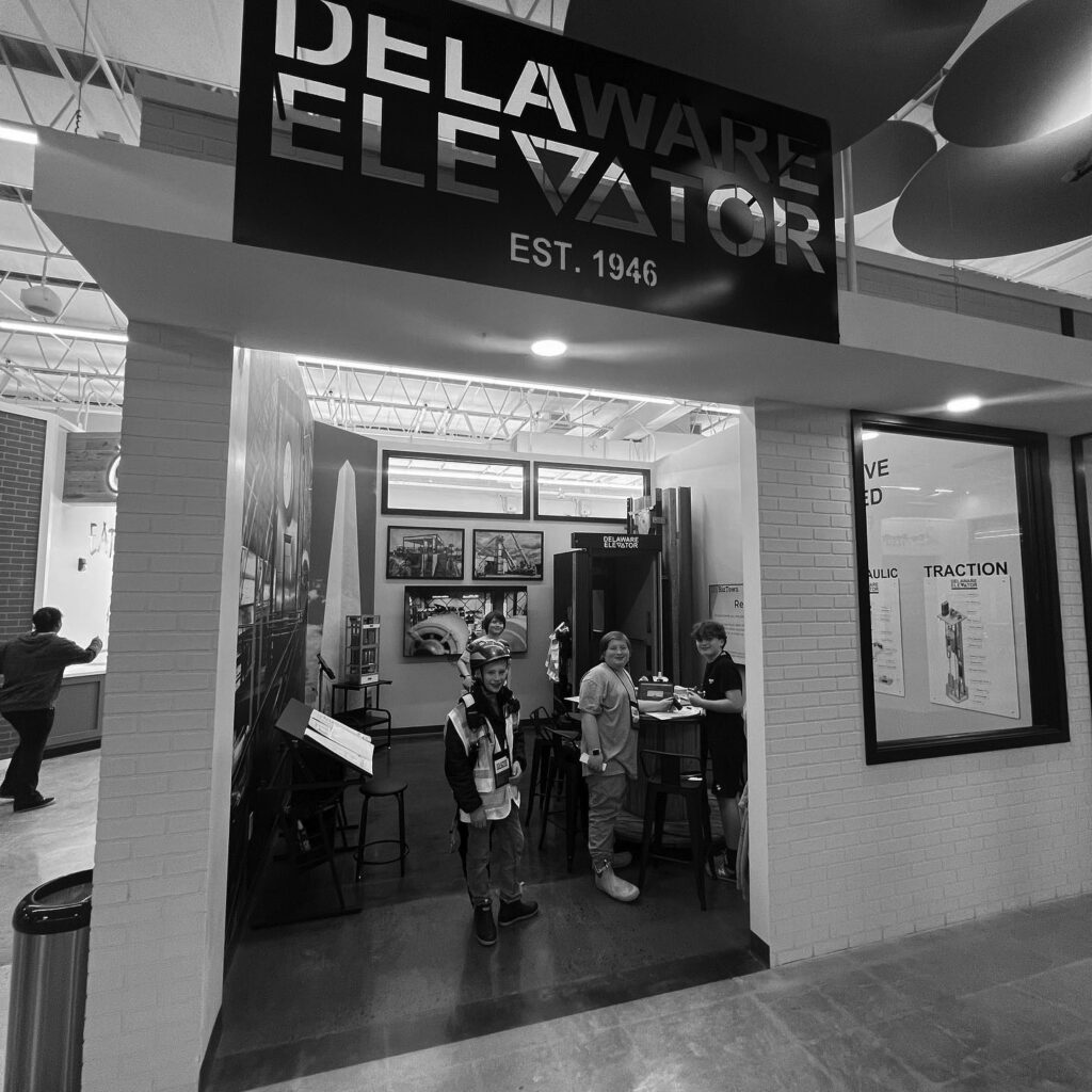 a black and white photo of a store entrance