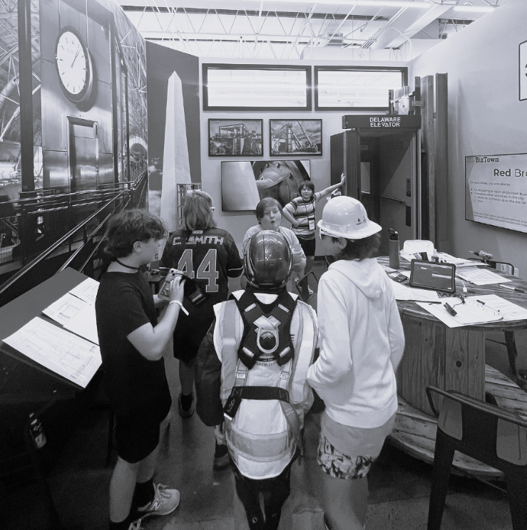 a group of people standing in a room