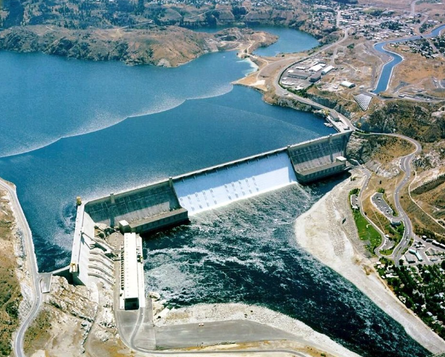an aerial view of a dam with a large body of water