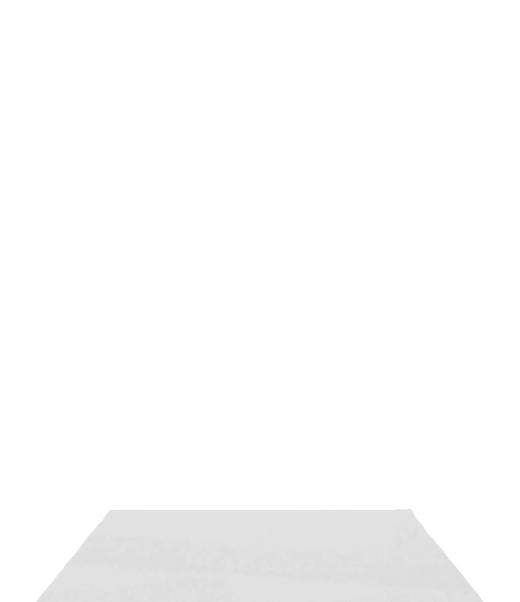 a black and white photo of a laptop on a desk