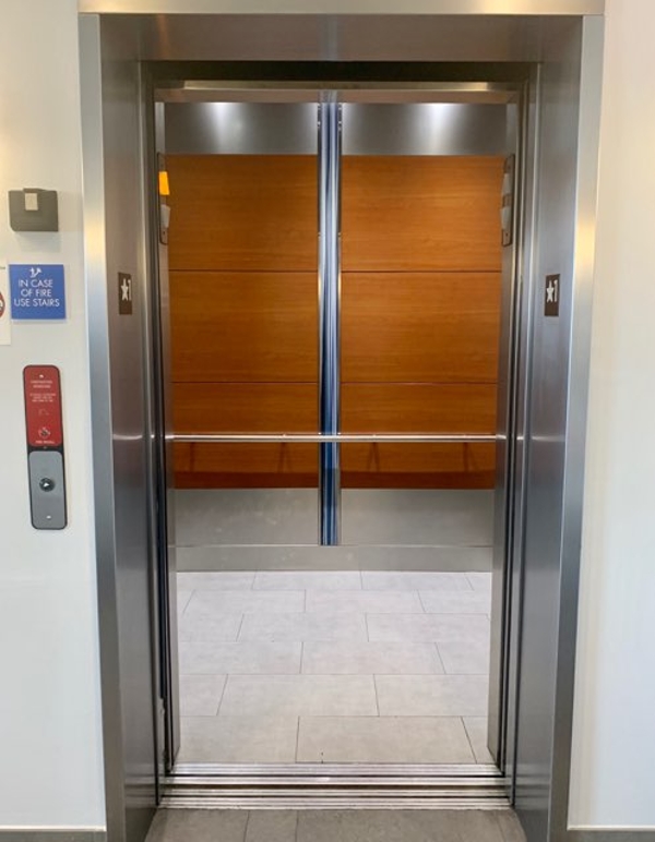 an empty elevator with a closed door