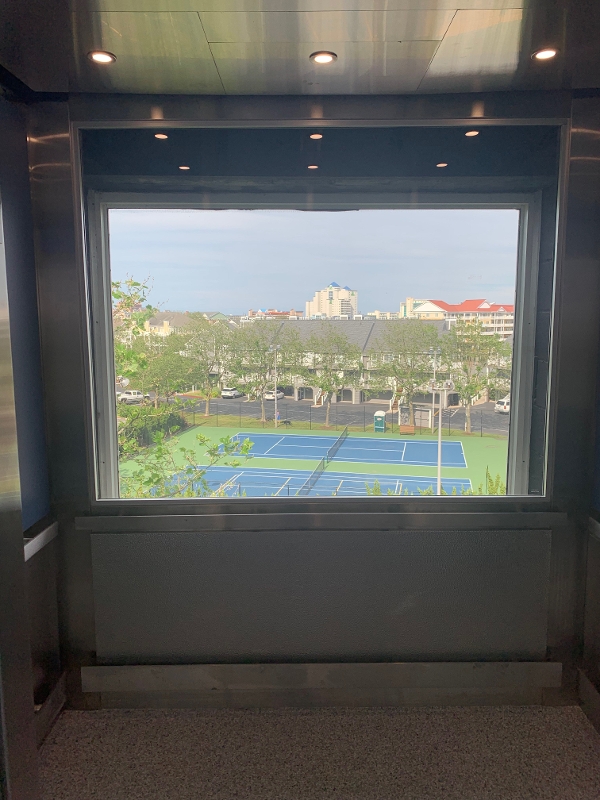 a view of a tennis court through a window