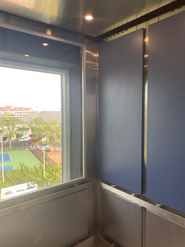 a view of a tennis court through a window
