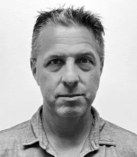 a black and white photo of a man