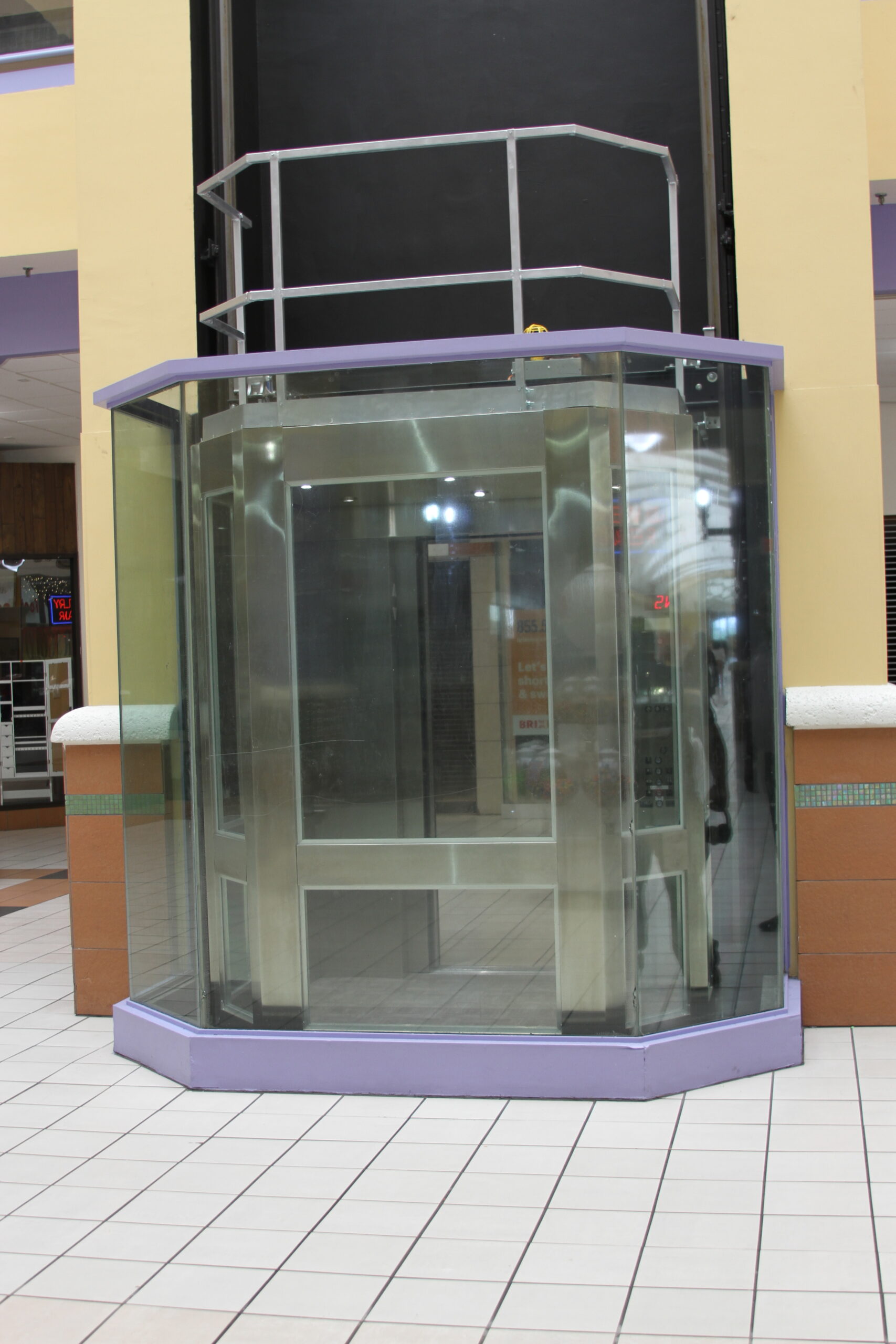 a large glass door in front of a building