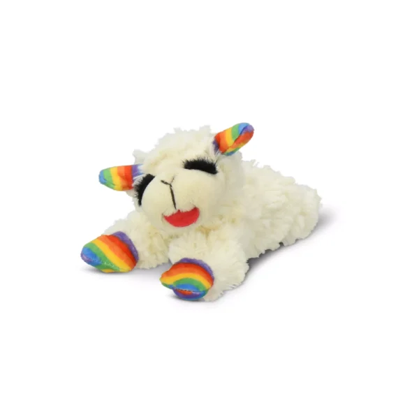 a white stuffed animal with a rainbow colored horn