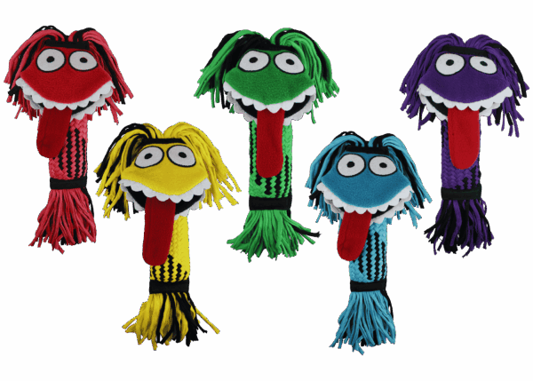 a group of stuffed animals that are on a green background