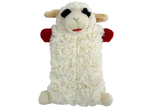 a stuffed sheep with a red heart on its chest
