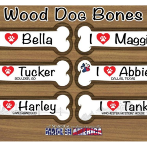 a set of four dog bone magnets on a wooden surface