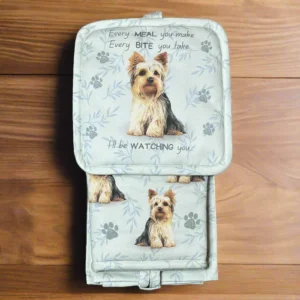 a dog themed pot holder with a picture of a dog on it