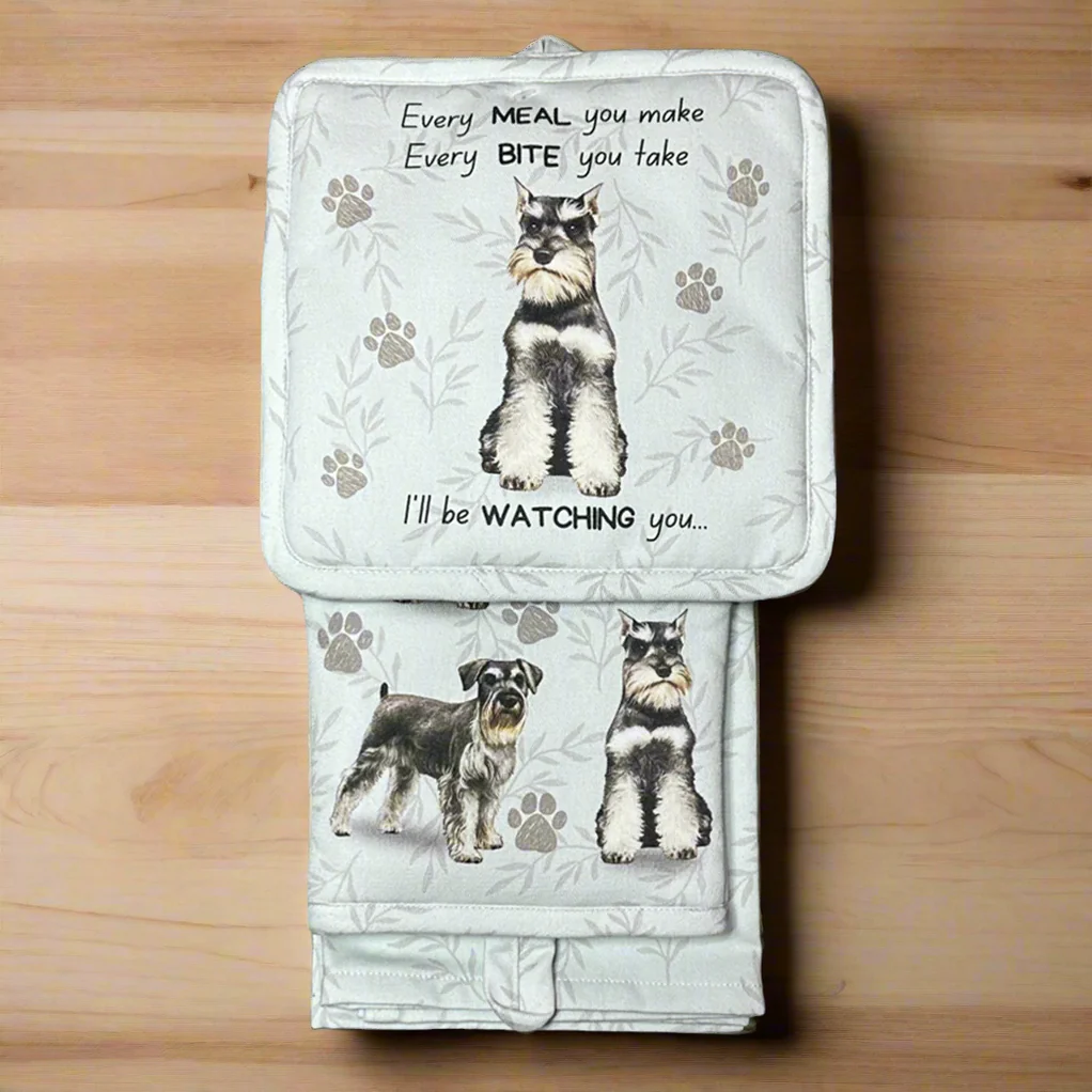 a pair of oven mitts with dogs on them