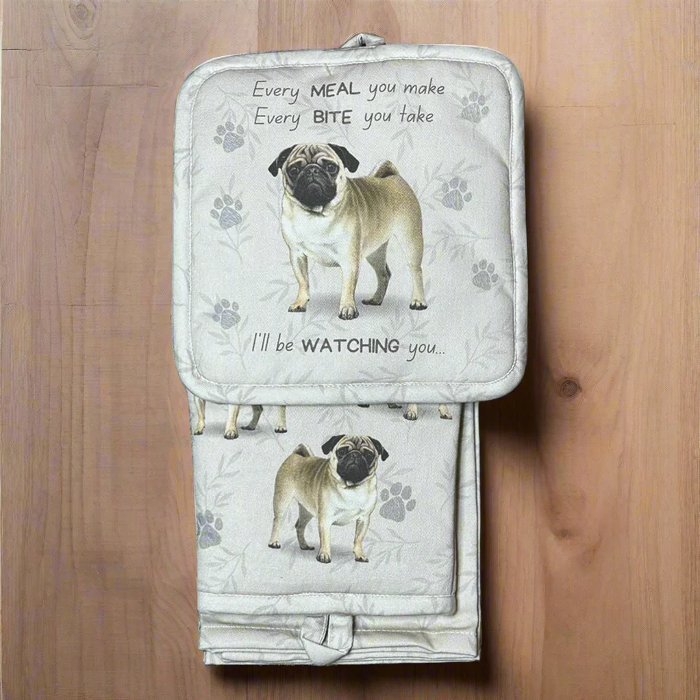 a pug dog on a white blanket with paw prints