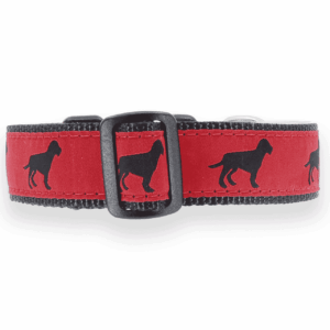 a red dog collar with black silhouettes on it