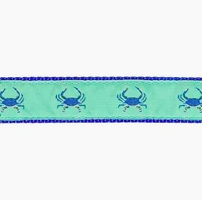 a blue ribbon with blue crabs on it
